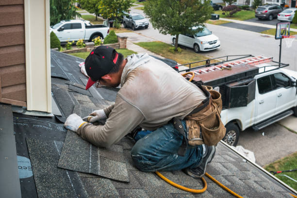 Professional Roofing technician working in Tappahannock, VA